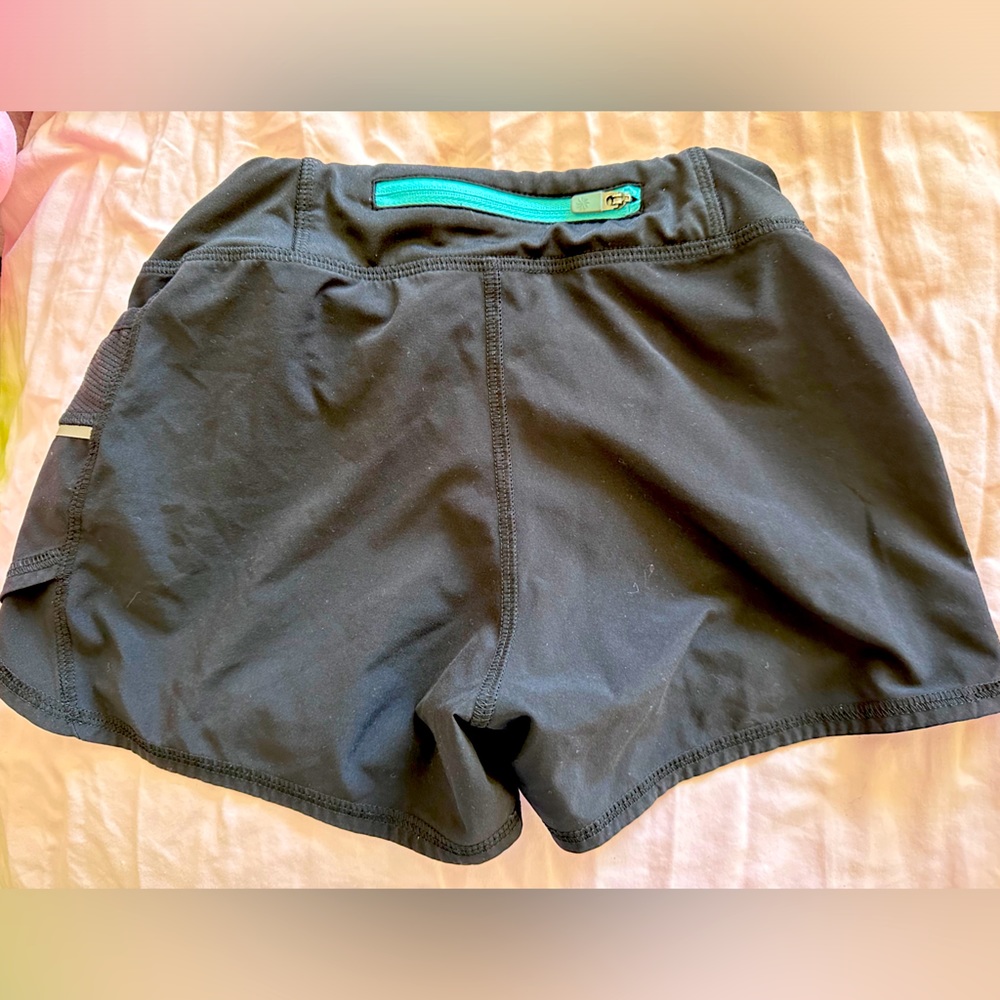 Athleta Black Girls' Athletic Shorts with Teal Zip Accent